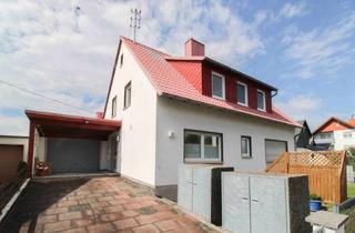 Anlageobjekt in 65232 Taunusstein, Dreifamilienhaus mit Gewerbefläche in Taunusstein