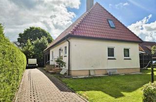 Einfamilienhaus kaufen in 26969 Butjadingen, Butjadingen - Großes, saniertes Einfamilienhaus mit Garage in einer Wohnsiedlung in Butjadingen-Stollhamm