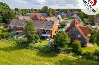 Haus kaufen in 26603 Aurich, Attraktives Reihenendhaus in Aurich – Ruhig Wohnen mit Blick ins Grüne und nur wenige Gehminuten bis