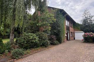 Haus kaufen in 27777 Ganderkesee, Charmantes Zweifamilienhaus mit großem Garten und Kamin in zentraler Lage von Ganderkesee