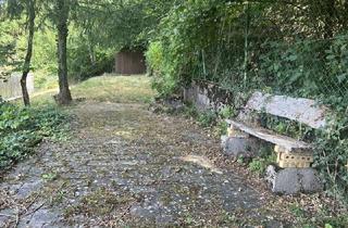 Grundstück zu kaufen in 74595 Langenburg, Raus aus dem Alltag: Idyllisches Gartengrundstück mit gepflasteter Terrasse und Wegen