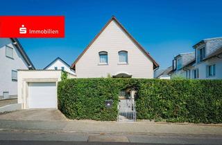 Einfamilienhaus kaufen in 65760 Eschborn, Eschborn: Freistehendes Einfamilienhaus mit Wohlfühlcharakter und gepflegtem Garten
