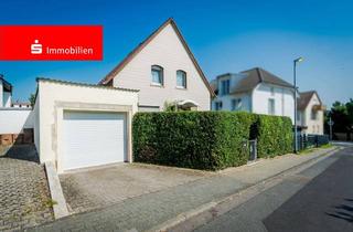 Einfamilienhaus kaufen in 65760 Eschborn, Eschborn: Freistehendes Einfamilienhaus mit Wohlfühlcharakter und gepflegtem Garten