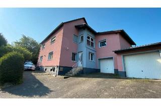 Haus kaufen in 35796 Weinbach, Weinbach - Zweifamilienhaus in Ortsrandlage