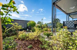 Wohnung kaufen in 24321 Lütjenburg, Moderne Neubau-Ferienwohnung mit großer Terrasse & eigenem Garten.