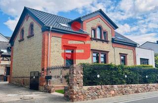 Haus kaufen in 55270 Schwabenheim, Charmantes Zweifamilienhaus mit idyllischem Garten in Top Zustand