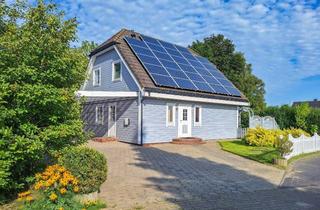 Haus kaufen in 25709 Diekhusen-Fahrstedt, Holzhaus-Atmosphäre zum Wohlfühlen