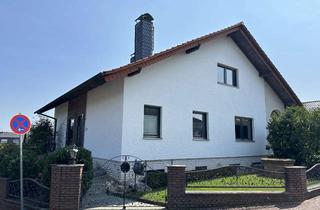 Einfamilienhaus kaufen in Taunusblick 16, 65510 Hünstetten, Großzügiges Einfamilienhaus mit Einliegerwohnung, EBK, Garagen und Garten in Wallrabenstein
