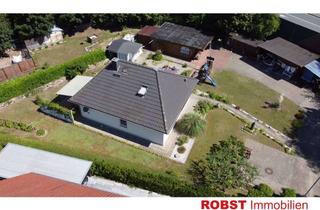 Haus kaufen in Am Kapellenberg, 23996 Bad Kleinen, Ebenerdiges Wohnen - Familienfreundlicher Bungalow mit tollem Garten und Kamin