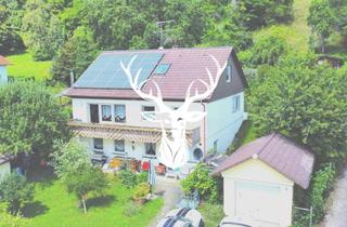 Haus kaufen in 79798 Jestetten, Zweifamilienhaus mit Bauland und Grünflächen in Jestetten zu verkaufen