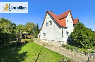 Doppelhaushälfte kaufen in 31079 Almstedt, Doppelhaushälfte mit Charme: 6 Zimmer, Kamin, großer Garten & Ausbaupotenzial