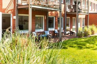 Wohnung kaufen in 26571 Juist, Moderne Erdgeschosswohnung am Januspark mit 2 Schlafzimmer und Garten