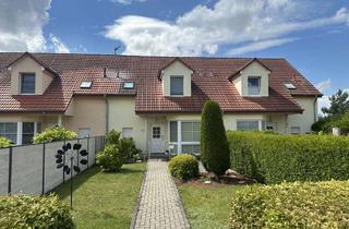 Haus kaufen in 06792 Sandersdorf, Exklusive Anlagechance: Vermietetes Reihenmittelhaus mit idyllischem Ausblick in bester Lage!