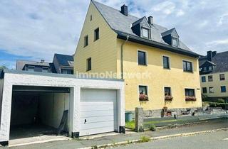 Mehrfamilienhaus kaufen in 95100 Selb, **Kapitalanlage mit Herz – gepflegtes Mehrfamilienhaus mit drei Wohneinheiten und Garagen**