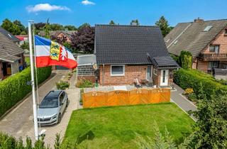 Einfamilienhaus kaufen in 24632 Lentföhrden, Modernisiertes Einfamilienhaus mit großem Garten.