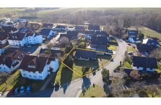 Einfamilienhaus kaufen in 34308 Bad Emstal, Charmanter Bungalow mit Klinkerfassade, großen Grundstück und Garage