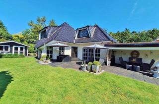 Einfamilienhaus kaufen in 25746 Ostrohe, Ostrohe - Exclusiver Winkelbungalow - Gepflegtes Zuhause mit Wohlfühlfaktor