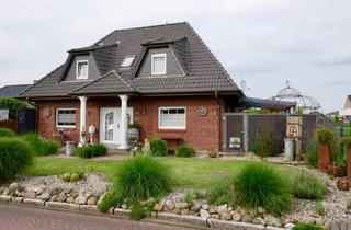 Einfamilienhaus kaufen in 25541 Brunsbüttel, Brunsbüttel - Wohnen und Wohlfühlen: Einfamilienhaus mit Gartenparadies