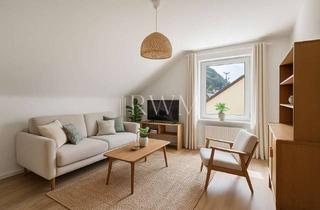 Wohnung kaufen in 72574 Bad Urach, Ihr Rückzugsort in Bad Urach – Dachgeschosswohnung mit Charme und Weitblick