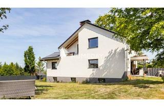 Einfamilienhaus kaufen in 65597 Hünfelden, Modernisiertes Einfamilienhaus mit großzügigem Wohnkomfort und nachhaltiger Technik