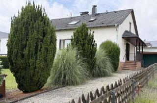 Haus kaufen in 65719 Hofheim am Taunus, Charmantes Ein-Zweifamilienhaus auf großem Grundstück in gepflegter Nachbarschaft