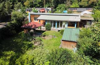 Haus kaufen in 14797 Kloster Lehnin, Ferienbungalow am Klostersee – Naturidyll mit Wintergarten und Kamin