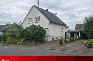 Einfamilienhaus kaufen in 56271 Mündersbach, Mündersbach: Freistehendes Einfamilienhaus mit Garten und 2 Garagen
