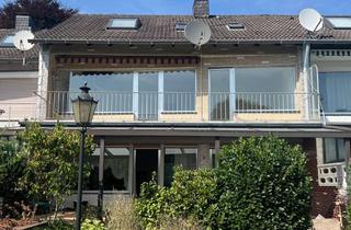 Reihenhaus kaufen in 40699 Erkrath, Außergewöhnlich breites Reihenhaus mit Südgrundstück und Pflegebedarf