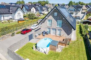 Einfamilienhaus kaufen in 51580 Reichshof, Modern, effizient, zukunftssicher – Einfamilienhaus mit Photovoltaik, Pool und großzügig