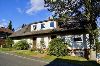 Haus kaufen in 65527 Niedernhausen, Zweifamilienhaus mit Einliegerwohnung und großem Grundstück sowie viel Potenzial in Niedernhausen