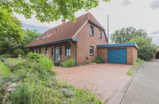 Doppelhaushälfte kaufen in 24768 Rendsburg, Fenomenal gepflegte Doppelhaushälfte mit Garage auf sonnigem und großem Grundstück in gefragter Lage
