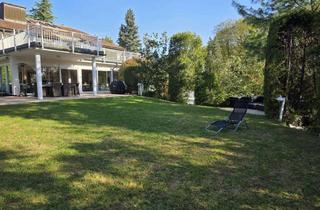 Wohnung kaufen in 65812 Bad Soden, Exklusive Großwohnung über 2 Ebenen mit idyllischem eigenem Garten und Spa-Bereich in bester Lage!