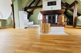 Wohnung kaufen in 23758 Göhl, Charmante Maisonette-Wohnung mit Sauna und zwei Balkonen