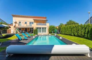 Villa kaufen in 91056 Büchenbach, HEGERICH: Grosszügige Villa mit Garten und Pool für die gesamte Familie