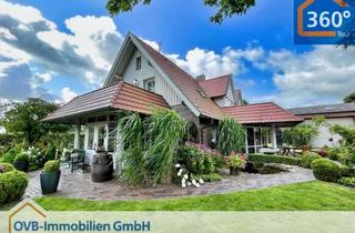 Haus kaufen in 26629 Großefehn, Hochwertiges Wohnhaus im Landhausstil mit liebevoll angelegtem Garten und großer Halle