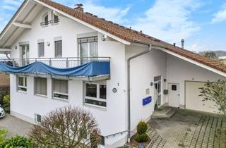 Anlageobjekt in 61273 Wehrheim, Attraktives Investment: Haus mit zwei Wohneinheiten, Gewerbefläche und vielen Stellplätzen