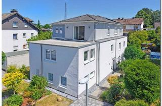 Haus kaufen in 34266 Niestetal, Niestetal - Modernes 3-Familienhaus mit 2 freien Wohnungen in Top-Lage von Sandershausen