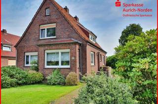 Einfamilienhaus kaufen in 26639 Wiesmoor, Modernisierungsbedürftiges Einfamilienhaus auf großem Grundstück in Zentrumsnähe von Wiesmoor