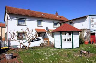 Einfamilienhaus kaufen in 61184 Karben, Großzügiges Einfamilienhaus mit Garten im Herzen von Groß-Karben
