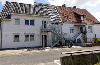 Mehrfamilienhaus kaufen in 31515 Wunstorf, Wunstorf - RUDNICK bietet 3-Familienhaus mit Blick aufs Landschaftsschutzgebiet