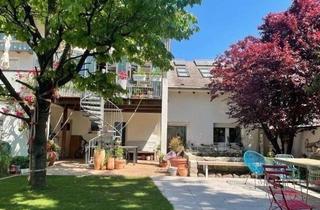 Wohnung kaufen in 76287 Rheinstetten, Traumhafte Wohlfühlarchitektur: moderne, großzügige Wohnung mit Garage, Terrassen & Familiengarten