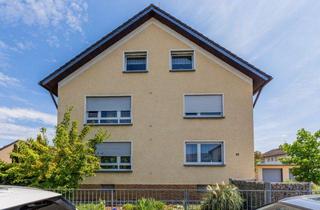 Anlageobjekt in 65428 Rüsselsheim, Vollvermietetes, gepflegtes 3-Familienhaus mit Tageslichtbädern, Garage und Garten in guter Wohnlage