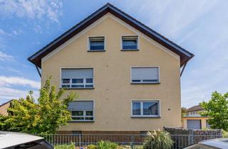 Anlageobjekt in 65428 Rüsselsheim, Vollvermietetes, gepflegtes 3-Familienhaus mit Tageslichtbädern, Garage und Garten in guter Wohnlage