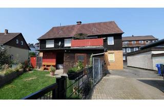 Haus kaufen in 38685 Langelsheim, Langelsheim - Geräumiges Ein- bis Zweifamilienhaus mit Terrasse, zwei Garagen.