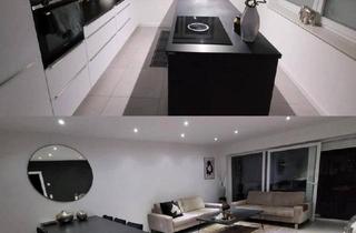 Wohnung kaufen in 33790 Halle, Halle - Moderne Erdgeschosswohnung mit großem Garten & Garage