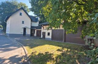 Haus kaufen in 56651 Niederzissen, Niederzissen - Kleines, freistehendes Haus mit Nebengebäuden