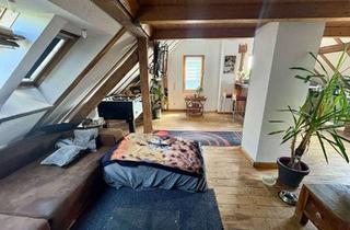 Wohnung kaufen in 67547 Worms, Charmante 2 ZKB Dachgeschosswohnung in Worms – Geschichte trifft modernen Komfort