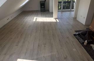 Wohnung kaufen in 35638 Leun, Dachgeschosswohnung mit Balkon