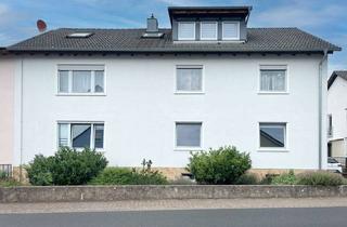 Haus kaufen in 63924 Kleinheubach, Klassisch & solide – Dreifamilienhaus mit Garten, Garagen und Potenzial in ruhiger Lage