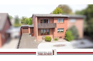 Doppelhaushälfte kaufen in 52531 Übach-Palenberg, Optimal für junge Familien: Doppelhaushälfte mit Garage und Garten in ruhiger Lage